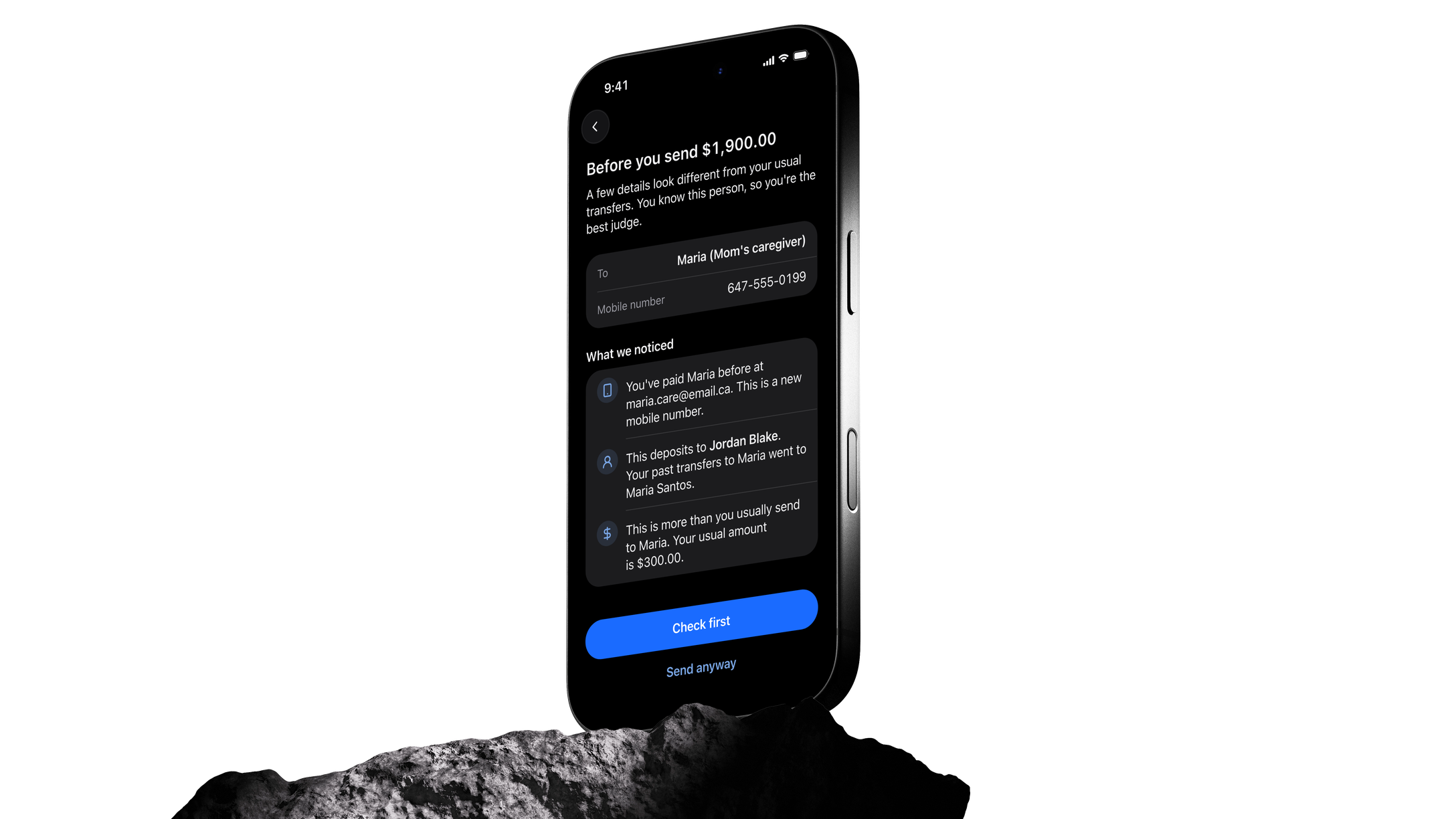 Signal's pause on a phone standing on a rock, listing what it noticed before a $1,900.00 transfer